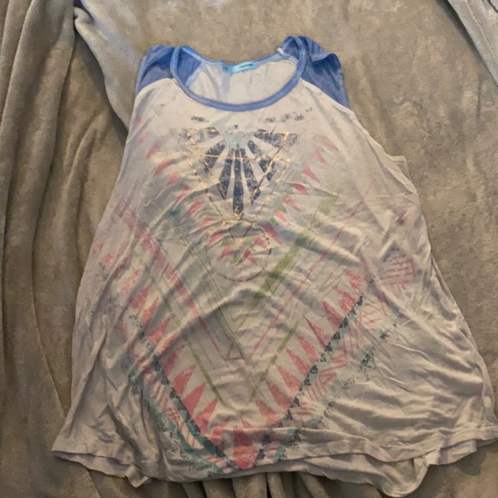 Tank top with an Aztec design.